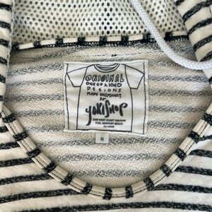 One of a kind french terry hoodie top.